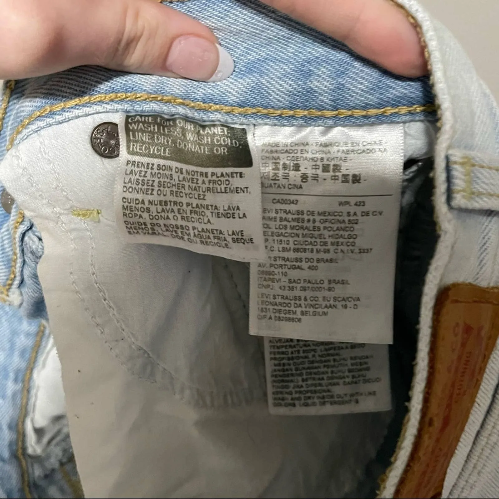 Levi’s Wedgie Fit Light Wash Distressed High Rise Shorts (25)