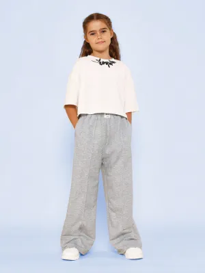 Tween Girls Crop Fit Raw Edge Graphic Print Tee And Pleated Jogger 2 Piece Set